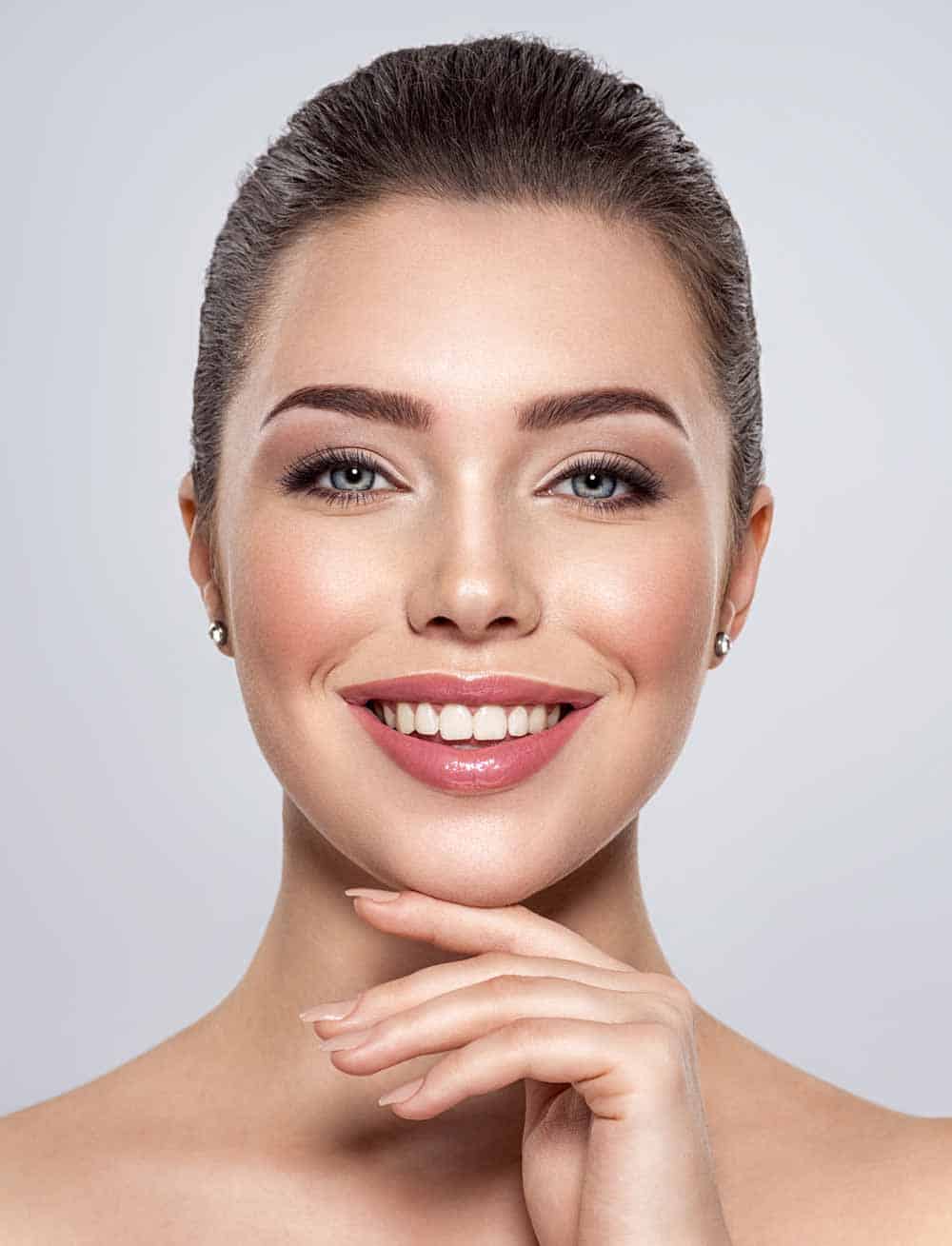 front-portrait-of-the-smiling-woman-with-beauty-fa-7MMD5WU.jpg by Avia Medical Spa in the United States